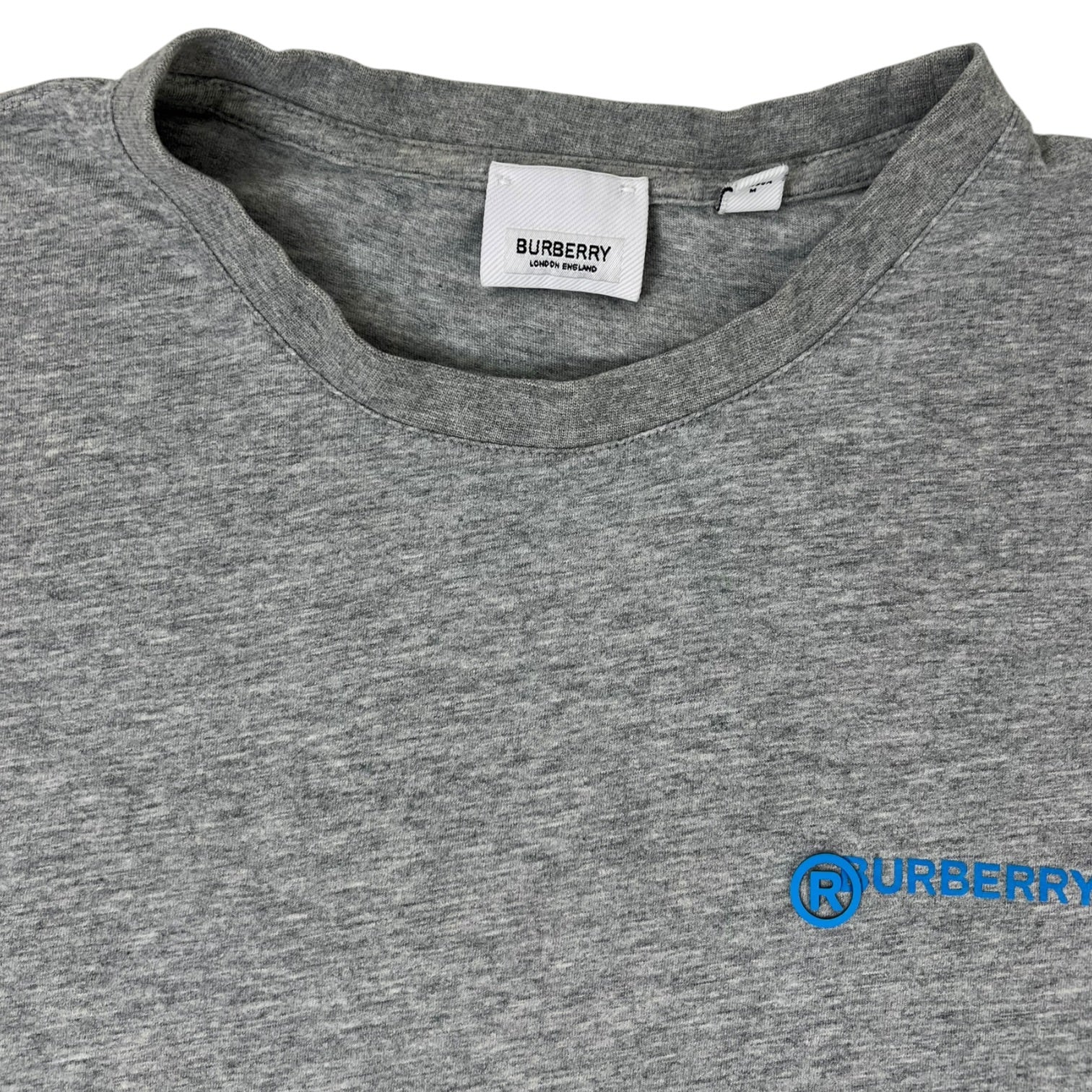 Burberry “Don’t Believe Everything You Think” Grey