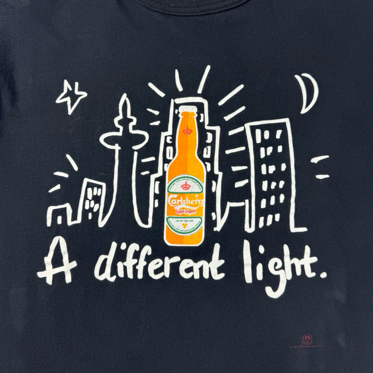 1990 Carlsberg Light “A Different Light” Beer Promo T-Shirt