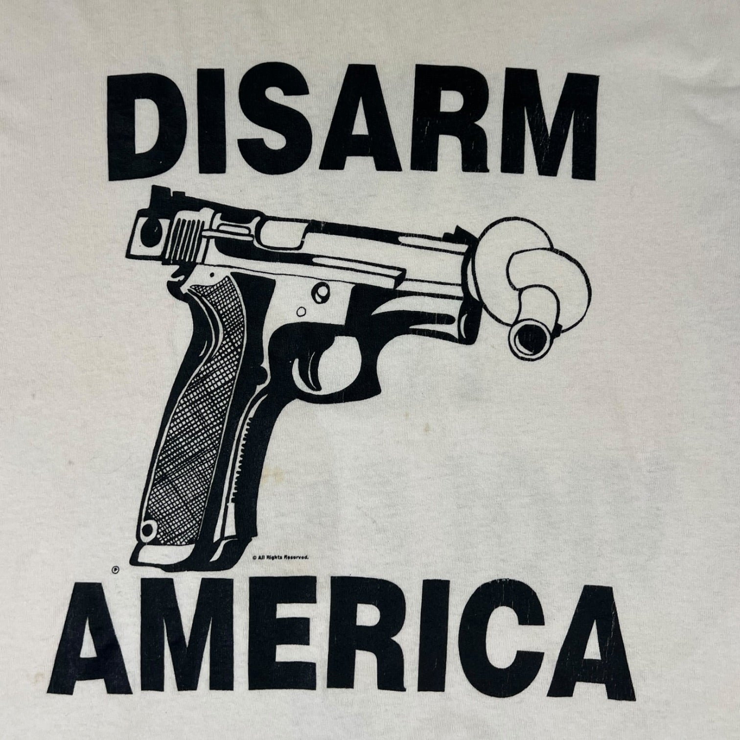 Vintage 1990’s “Disarm America” T-Shirt White