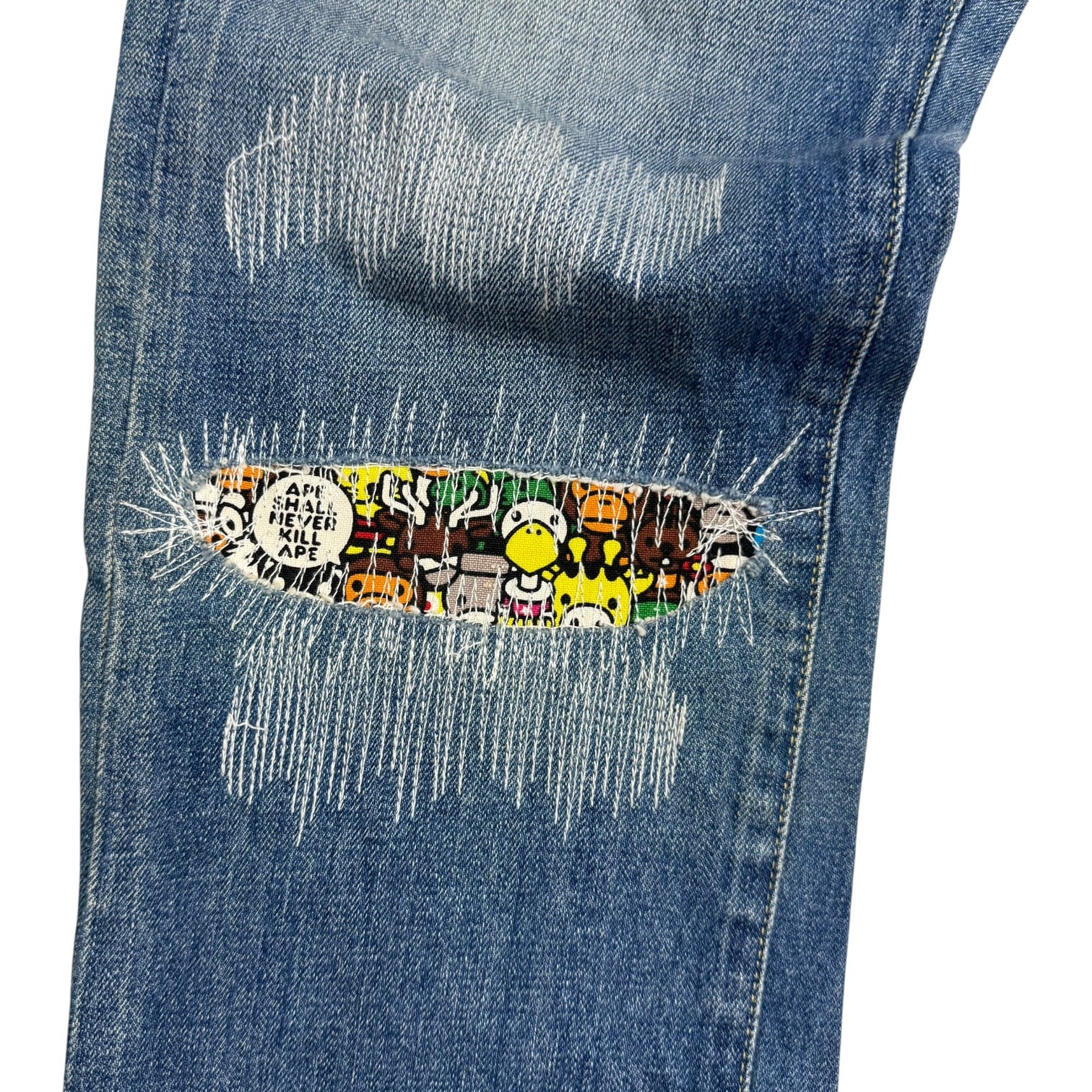 A Bathing Ape Milo Animal Safari Damaged Denim Pants Medium Wash