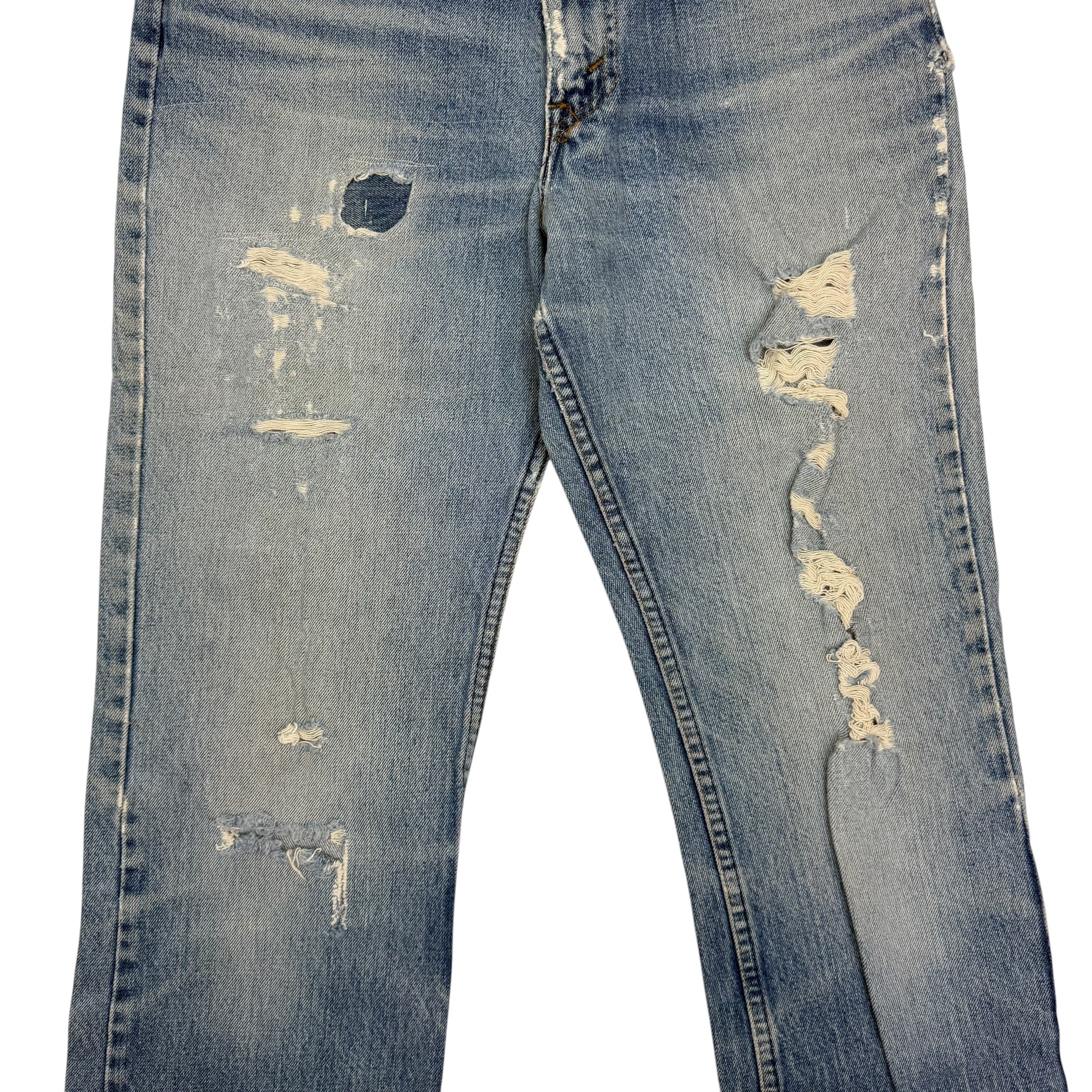 Vintage Levi’s Distressed Light Wash Flared White Tab Jeans