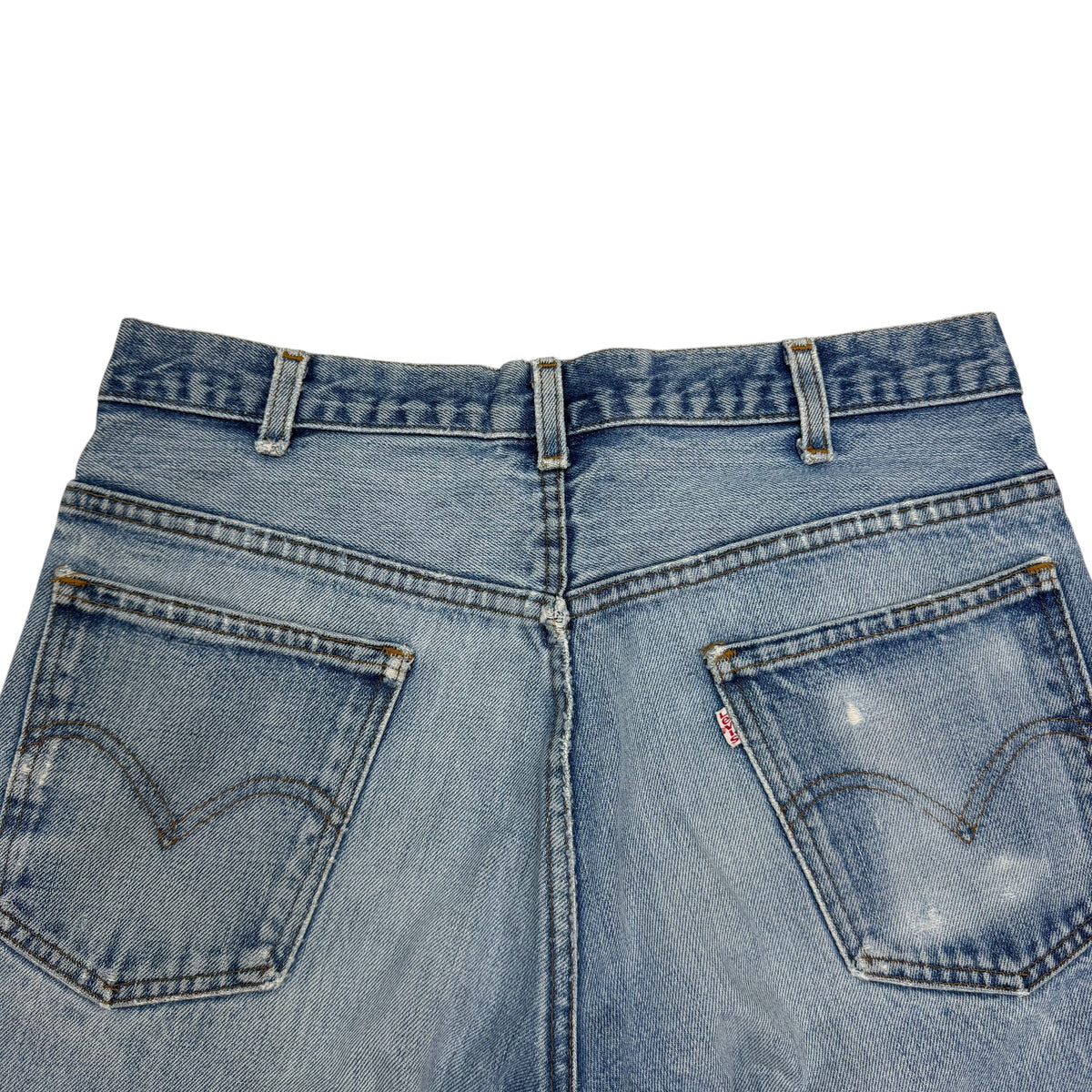 Vintage Levi’s Distressed Light Wash Flared White Tab Jeans