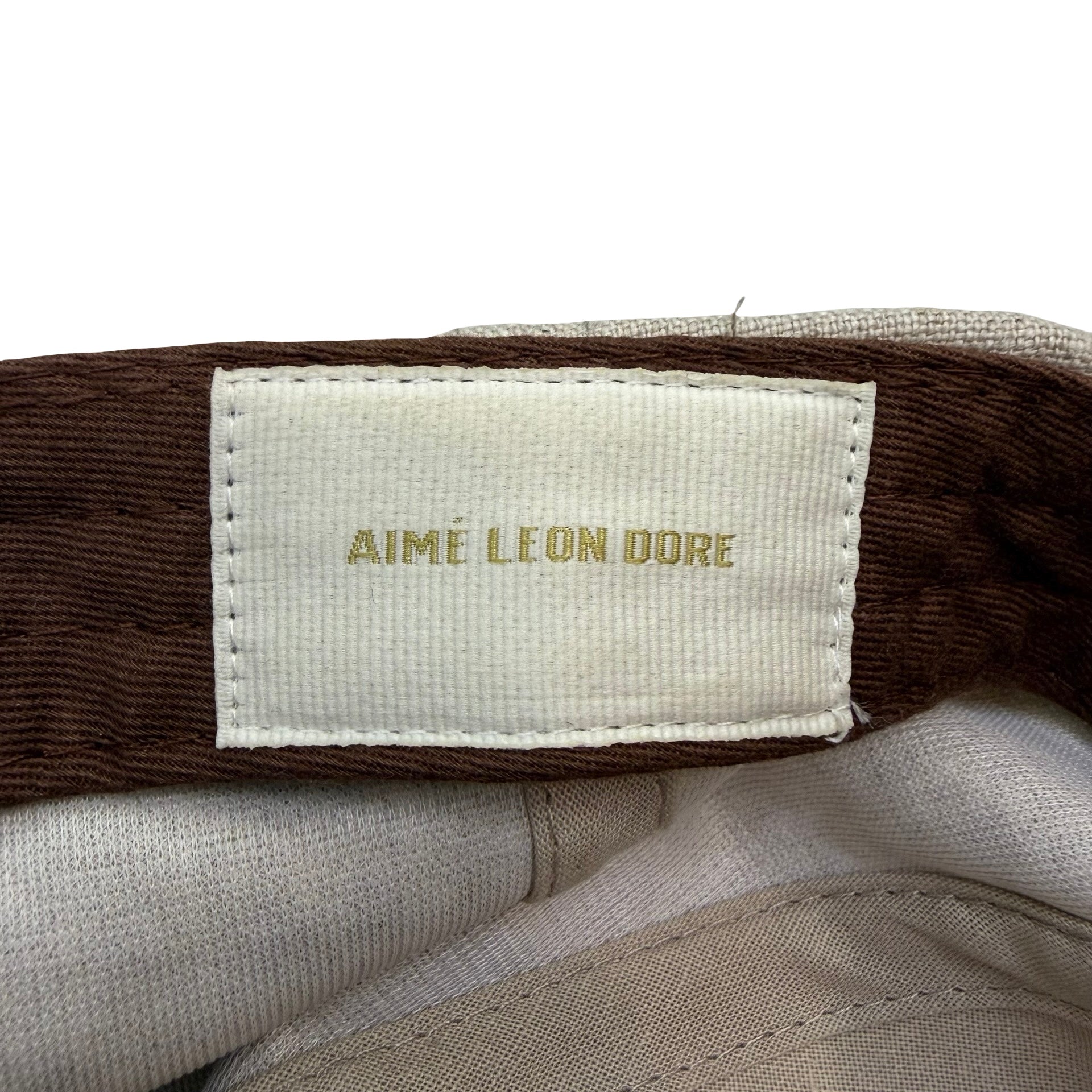 Aimé Leon Dore Unisphere Leather Brim Hat Beige