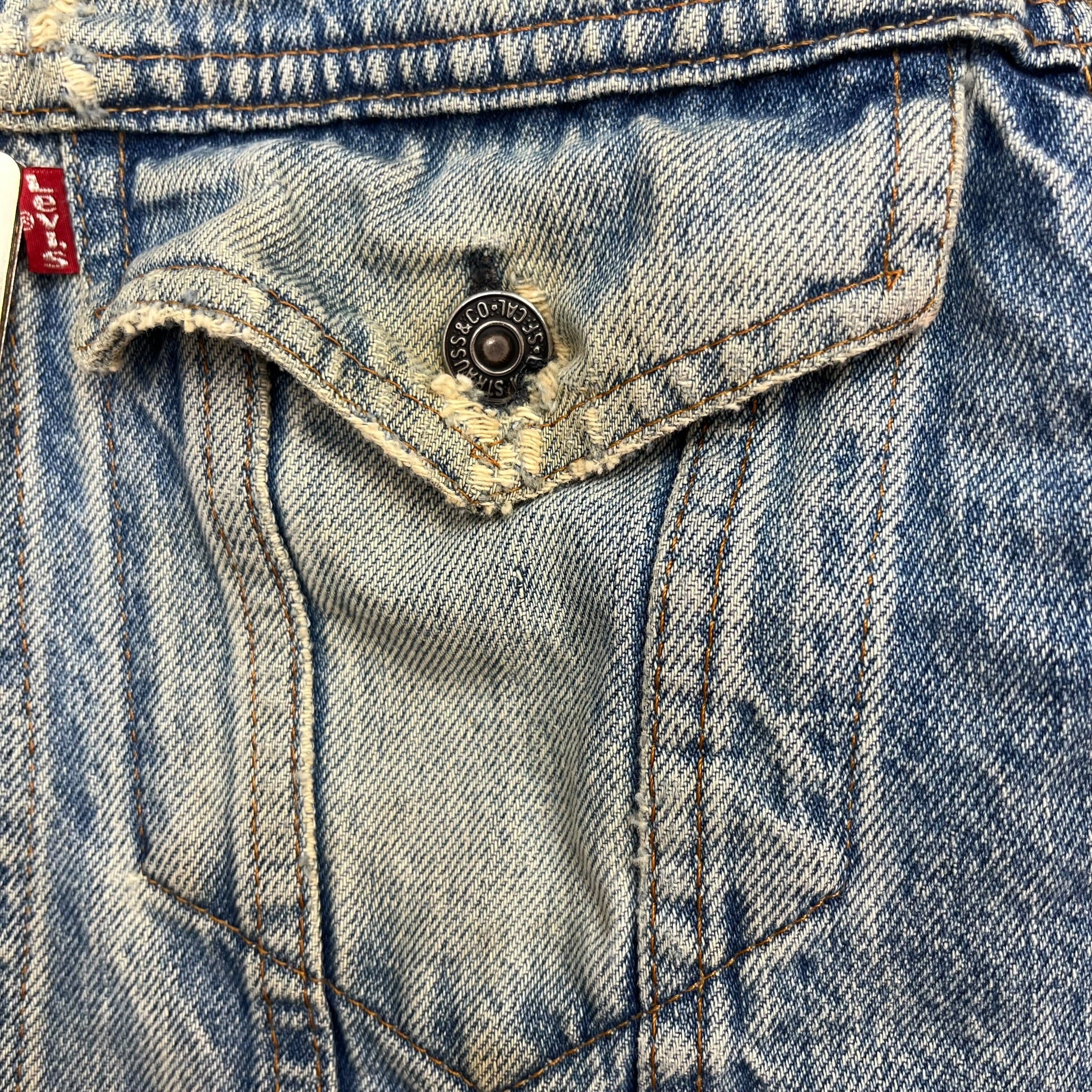 Vintage Levi’s Distressed Denim Trucker Jacket