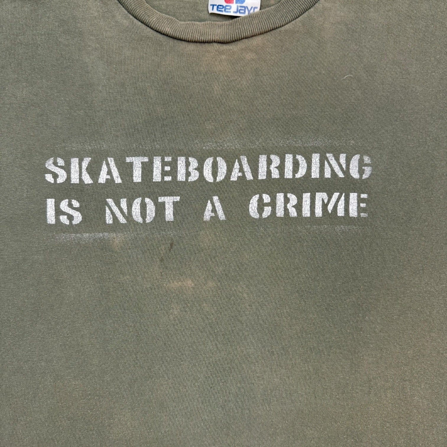 Vintage Skateboarding Is Not A Crime Tee Green